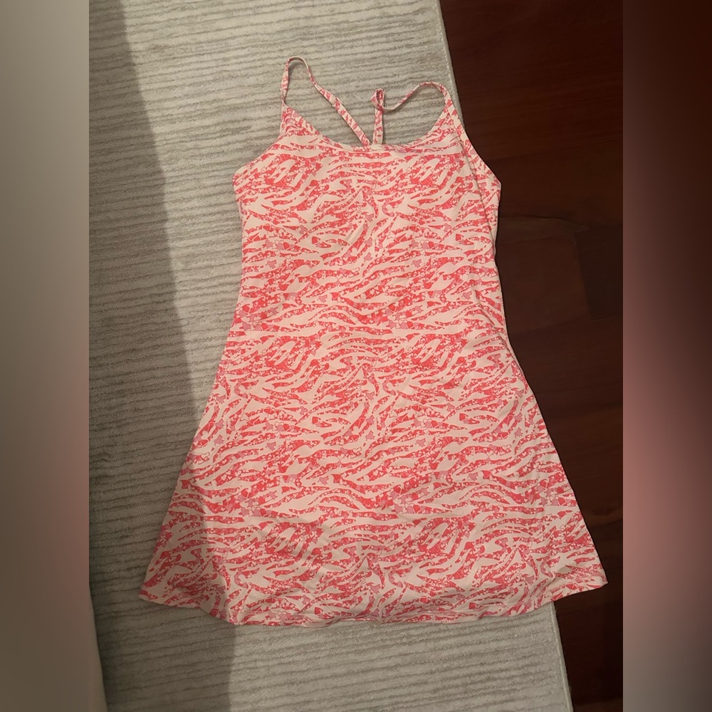 Pink pattern exercise dress in size small